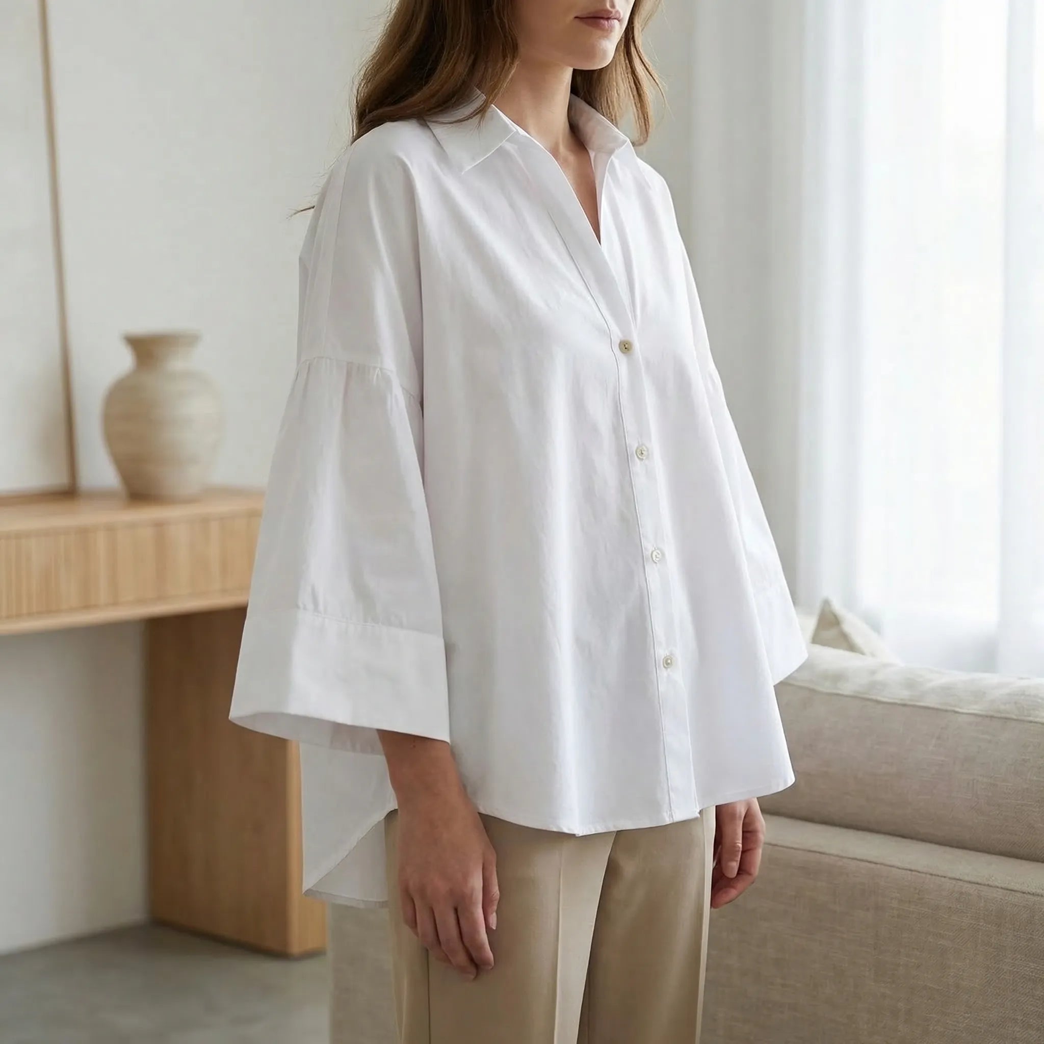 Nordspur | Sevelline Wide-Sleeve Asymmetric Hem Blouse